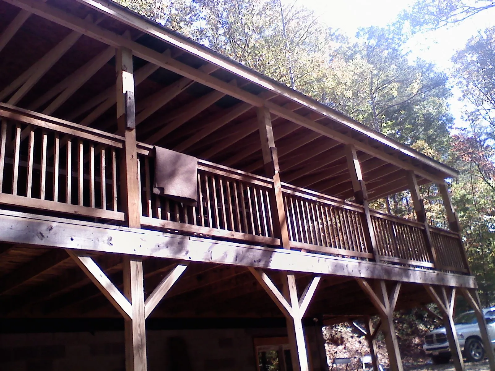 Timber framing under a new elevated porch and deck — Roof Leak Repair in Elon by Roofing Brothers